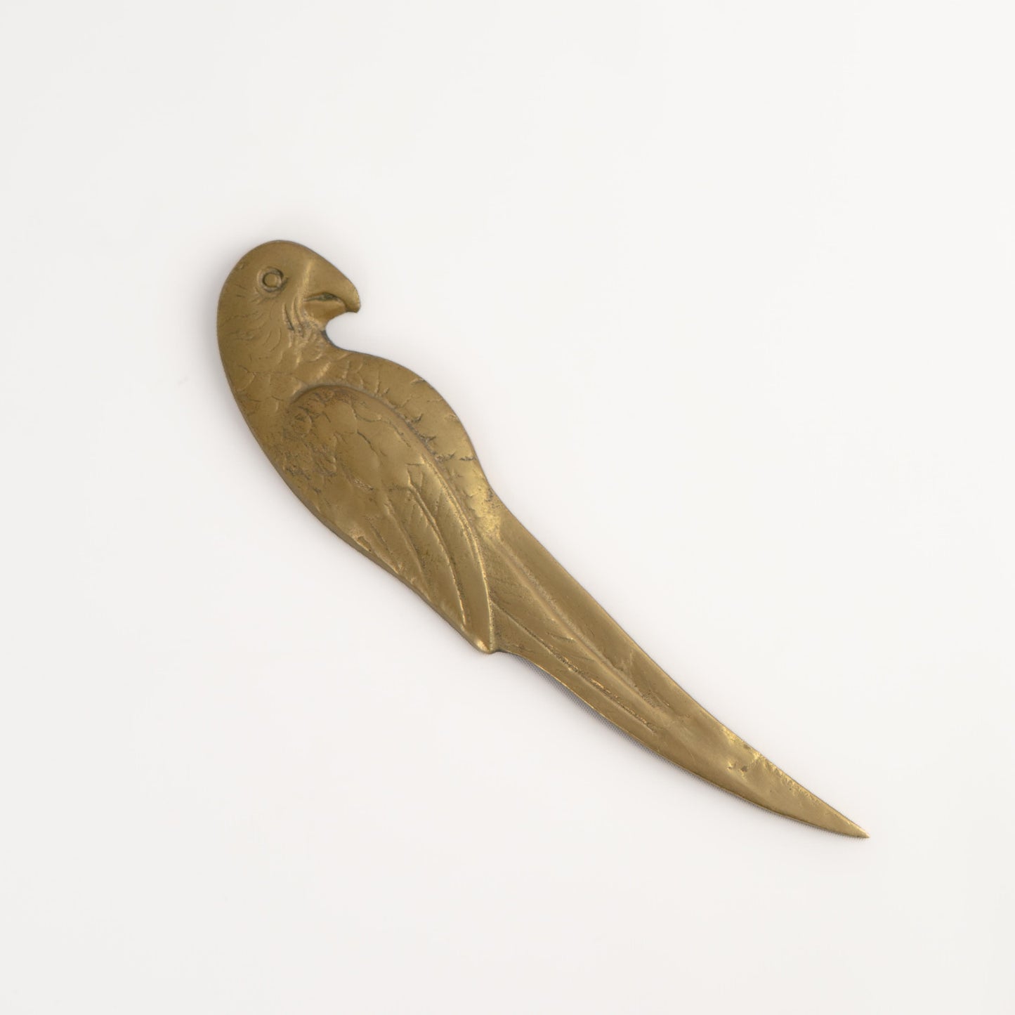 Vintage parrot brass letter opener or wick dipper from the 1960s-1970s