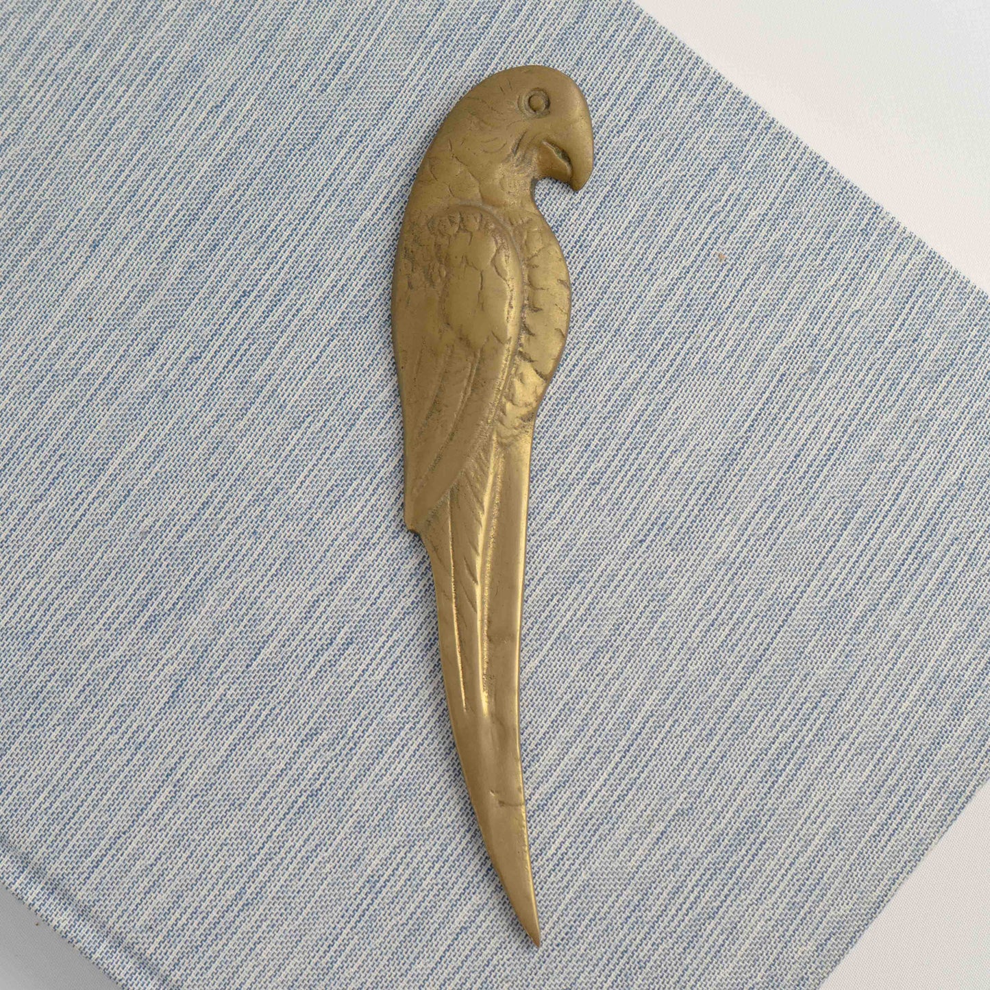 Vintage parrot brass letter opener or wick dipper from the 1960s-1970s