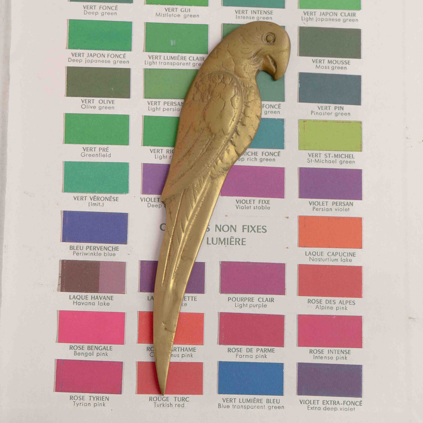 Vintage parrot brass letter opener or wick dipper from the 1960s-1970s