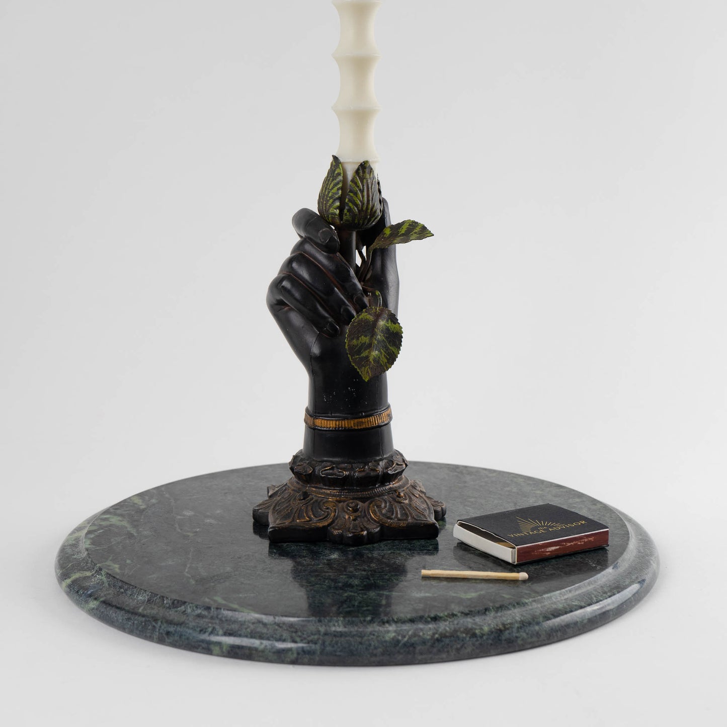 Vintage Petites Choses Iron Hand Candle Holder  with white bamboo candle