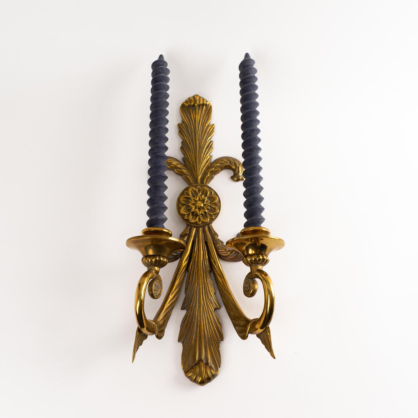 Vintage Brass French Art Nouveau-Style Candle Sconces holding black spiral tapers