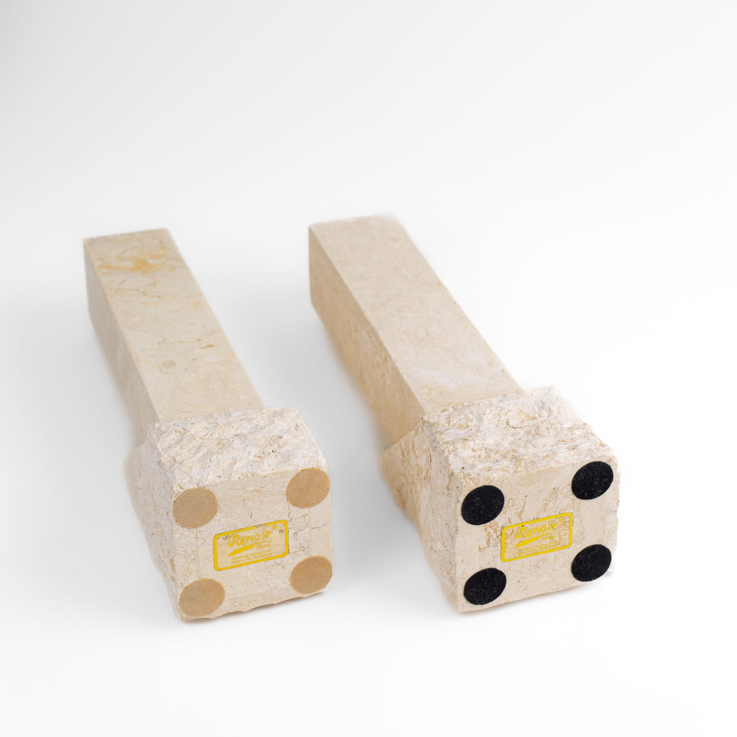 Vintage sculptural travertine candleholder pair with contrasting polished and natural stone textures