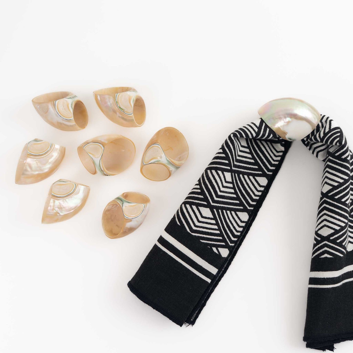 Vintage natural seashell napkin rings set of eight from the 1980s styled with a vintage napkin
