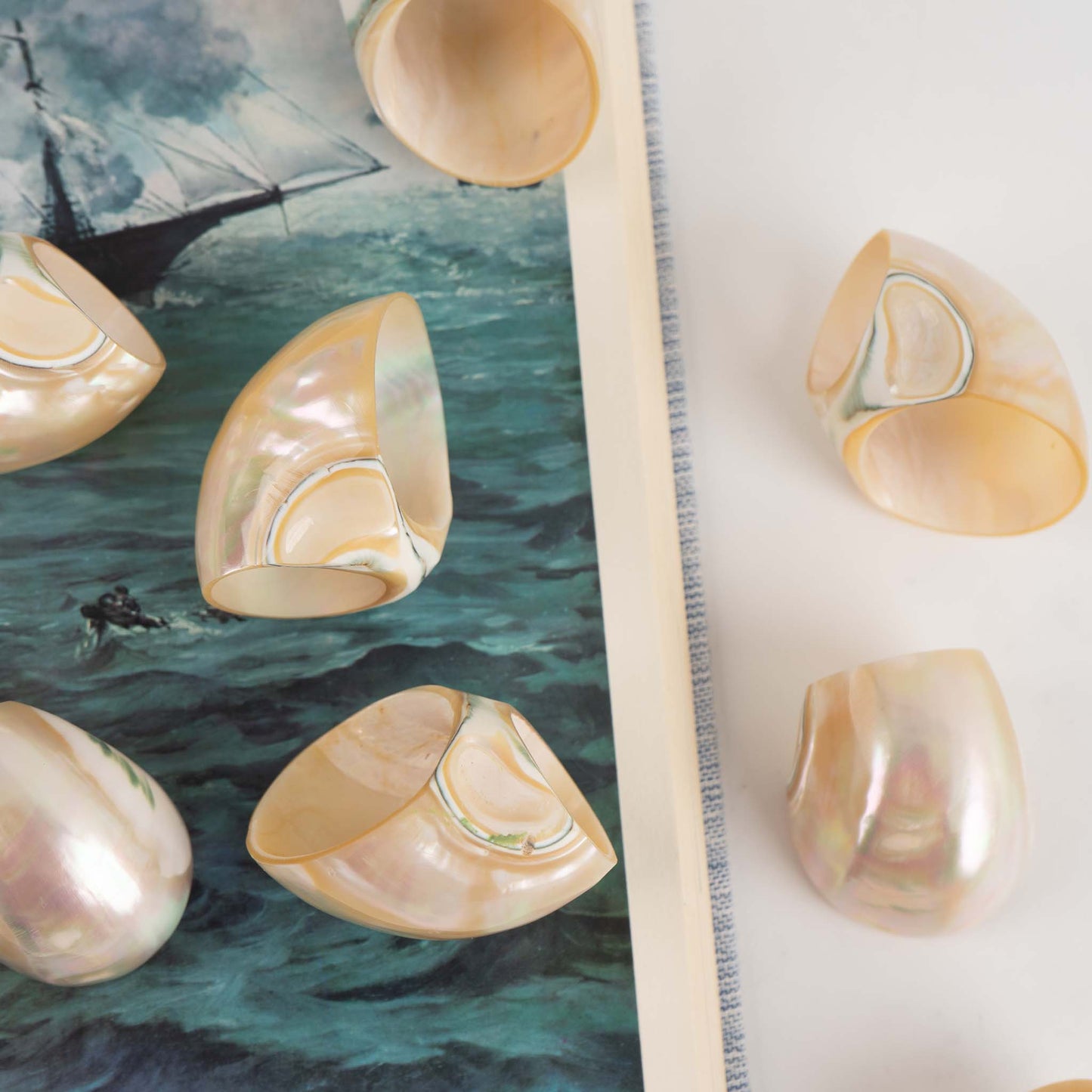 Vintage natural seashell napkin rings set of eight from the 1980s - closeup styled shot