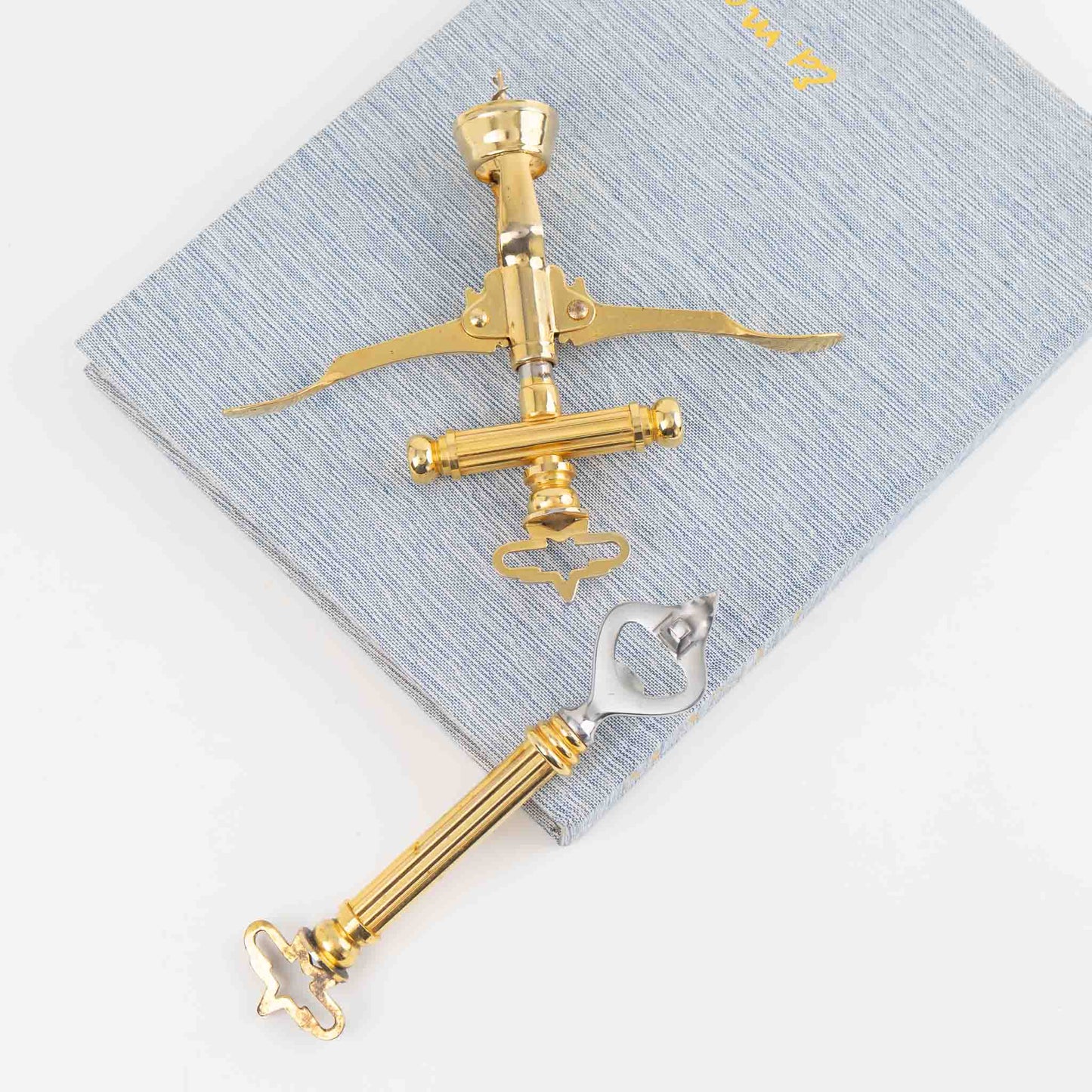 Vintage Italian brass corkscrew and bottle opener set from the 1970s-80s, showing elegant brass-plated metal construction