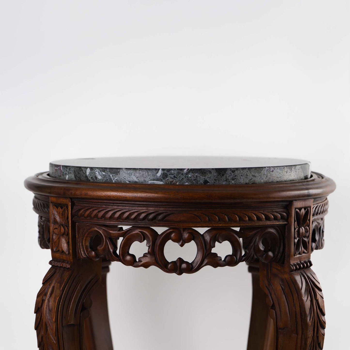Vintage mahogany wood side table with round dark black and green marble inlay center piece in French antique style