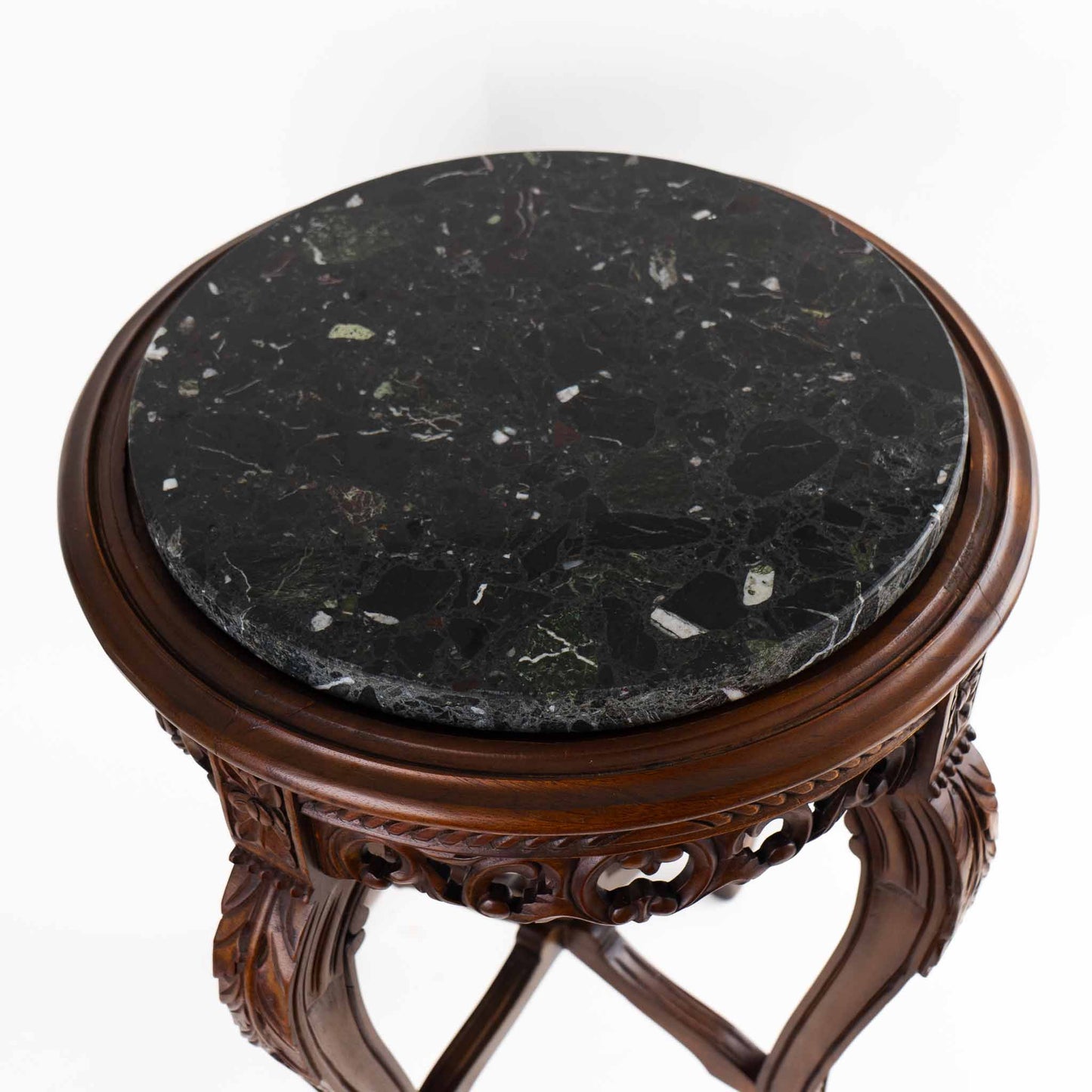 Vintage mahogany wood side table with round dark black and green marble inlay center piece in French antique style