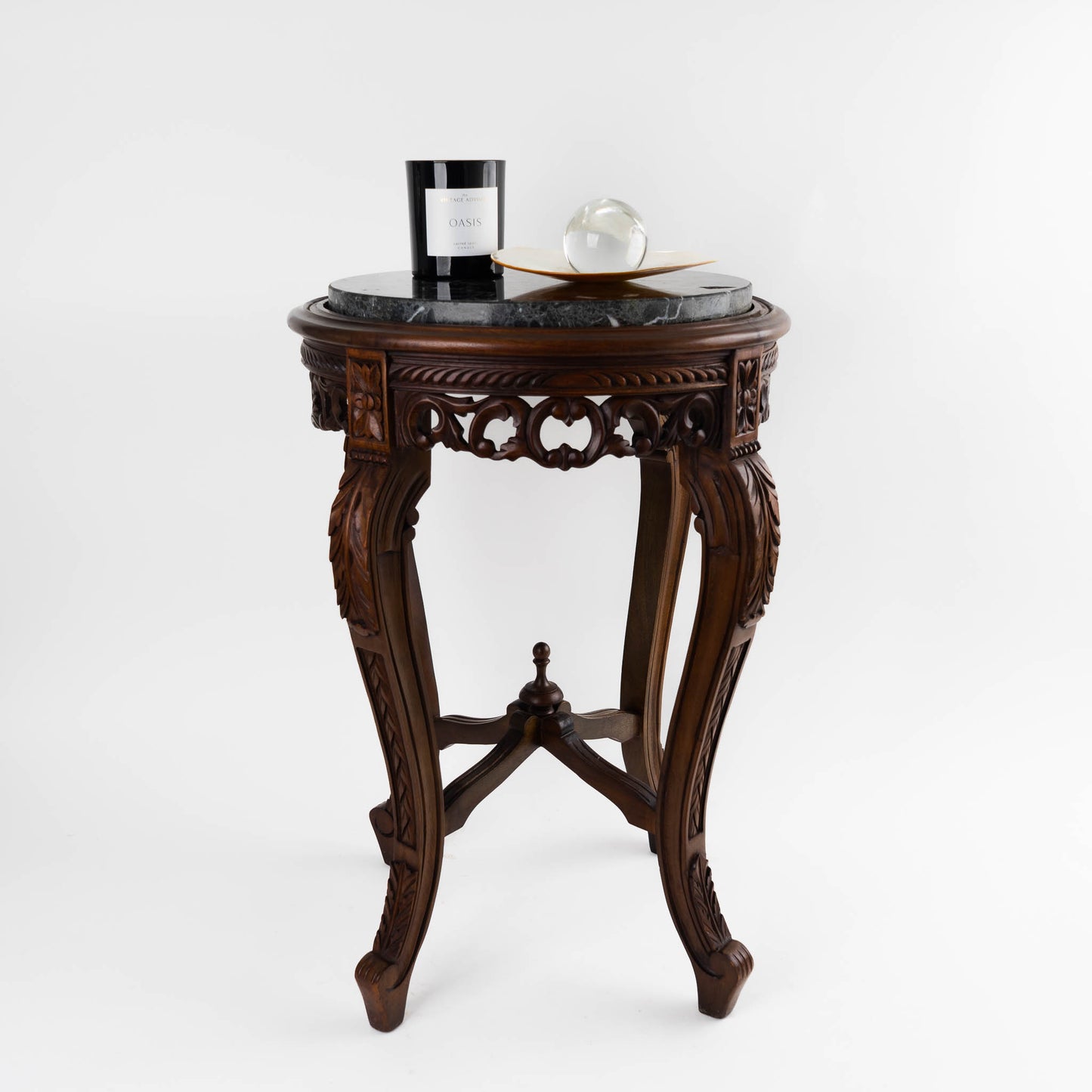 Vintage mahogany wood side table with round dark black and green marble inlay center piece in French antique style