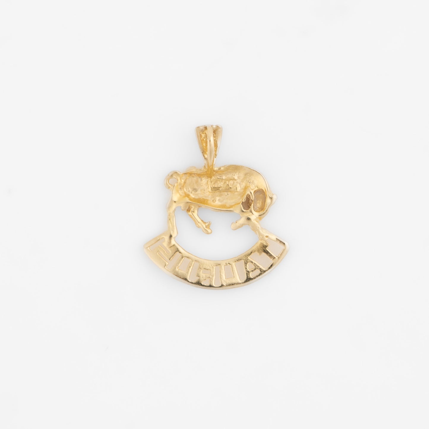 Vintage 14k yellow gold Taurus pendant with 3D bull design and Taurus text, showing front and back with 14K hallmark