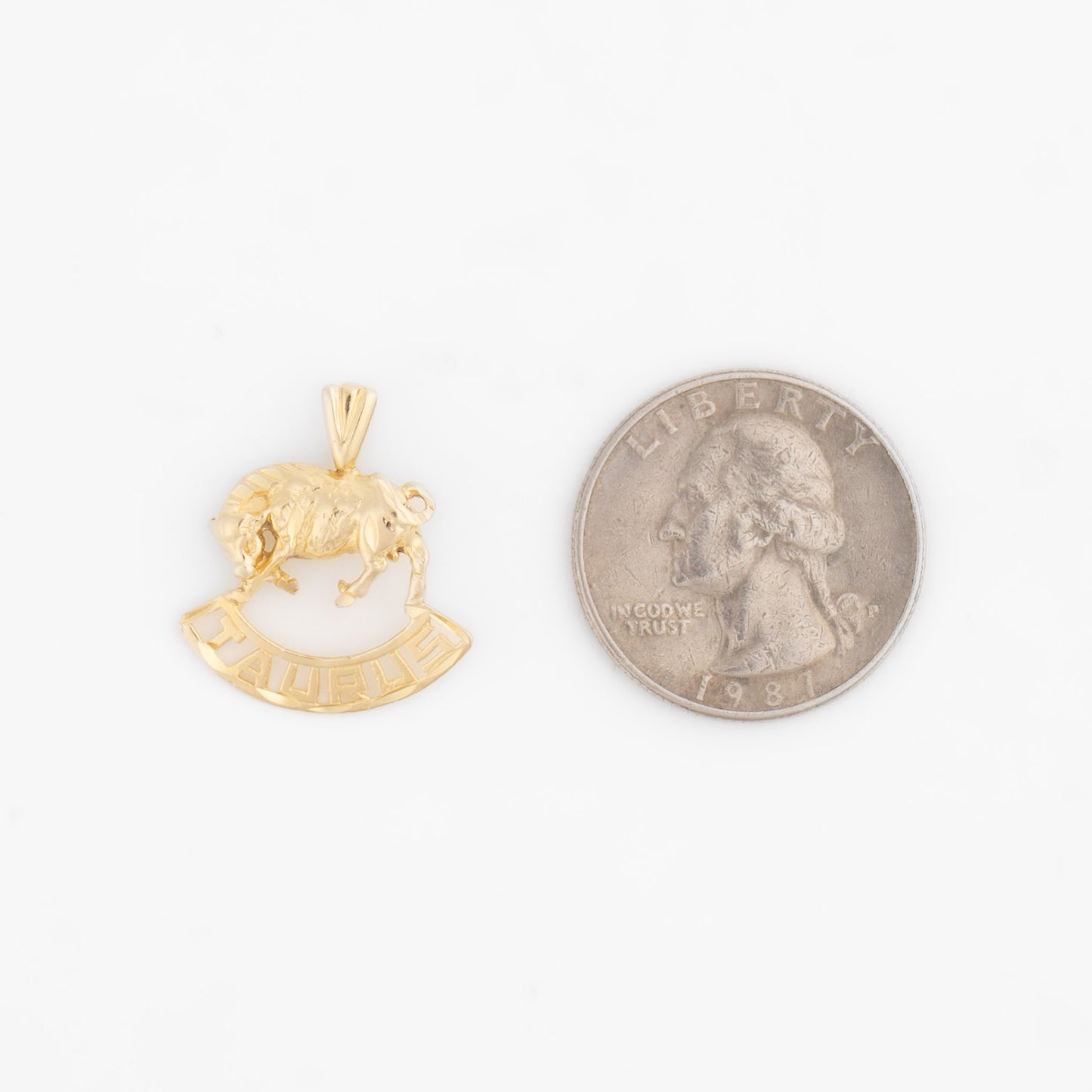 Vintage 14k yellow gold Taurus pendant with 3D bull design and Taurus text