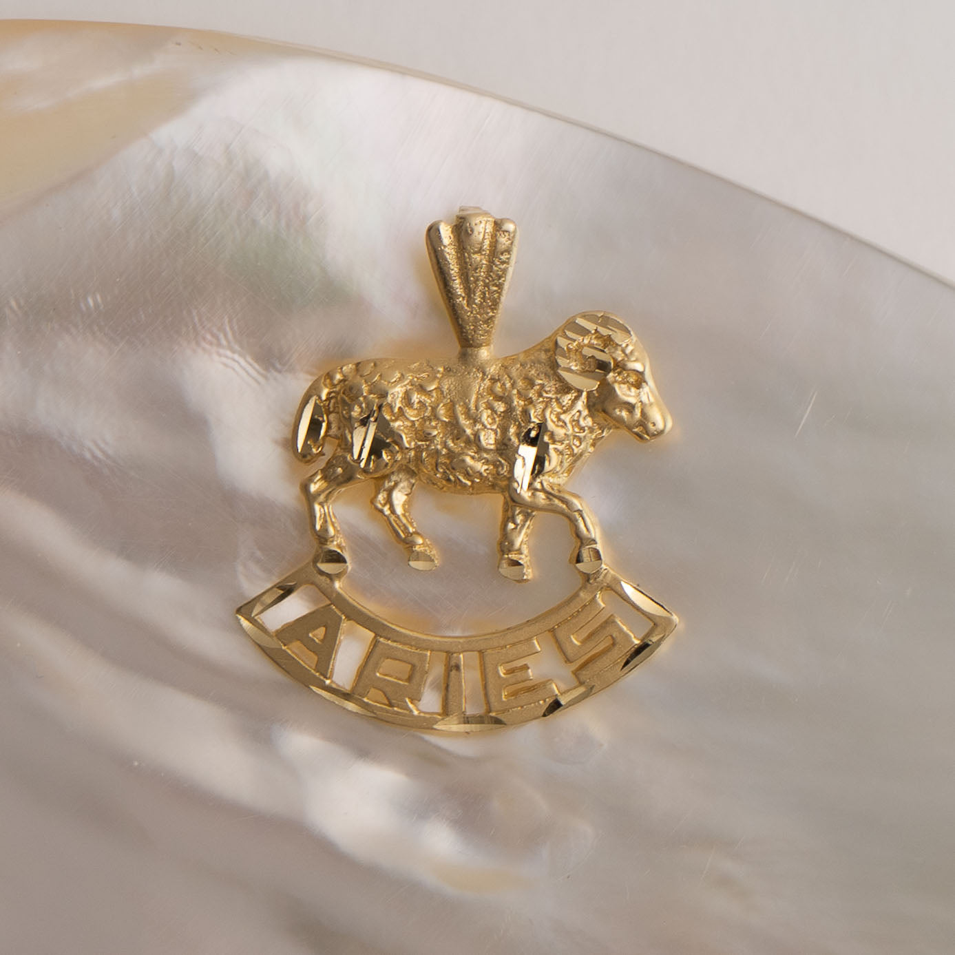 Vintage 14k yellow gold Aries pendant with 3D ram design and Aries text