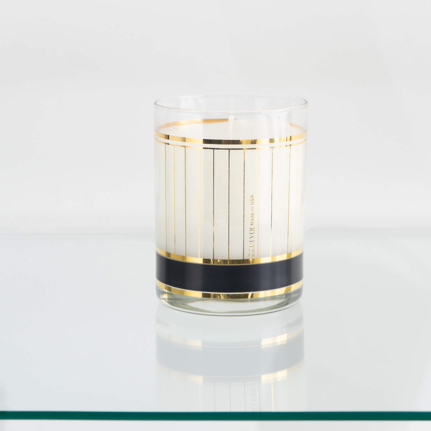 Vintage Black and Gold Stripe Culver Glass Candle on vintage bar glass shelf