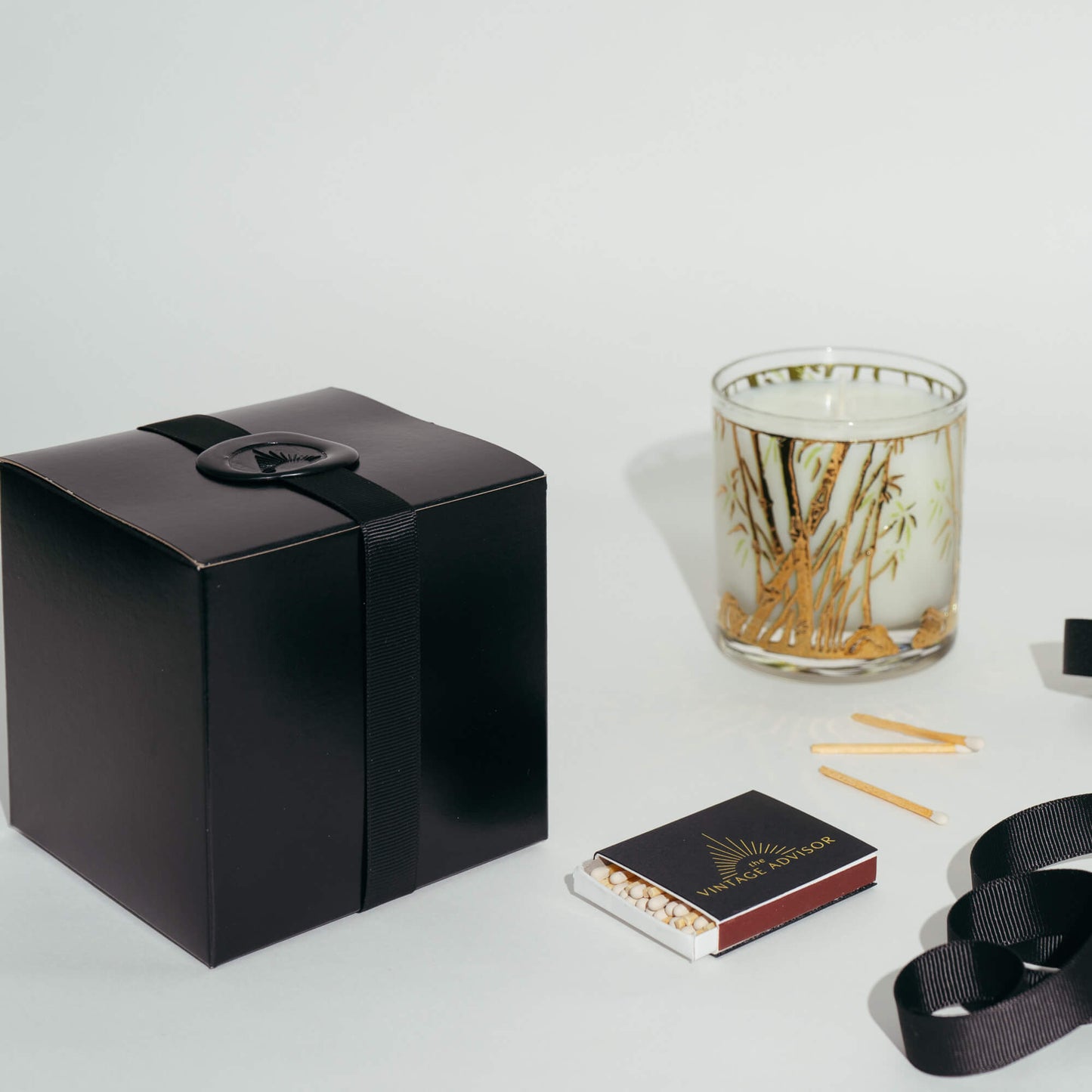 Vintage Bamboo Glass Candle with elegant black gift box with a wax seal and ribbon