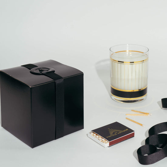 Vintage Black and Gold Culver Glass Candle comes with a black gift box with ribbon and a wax seal