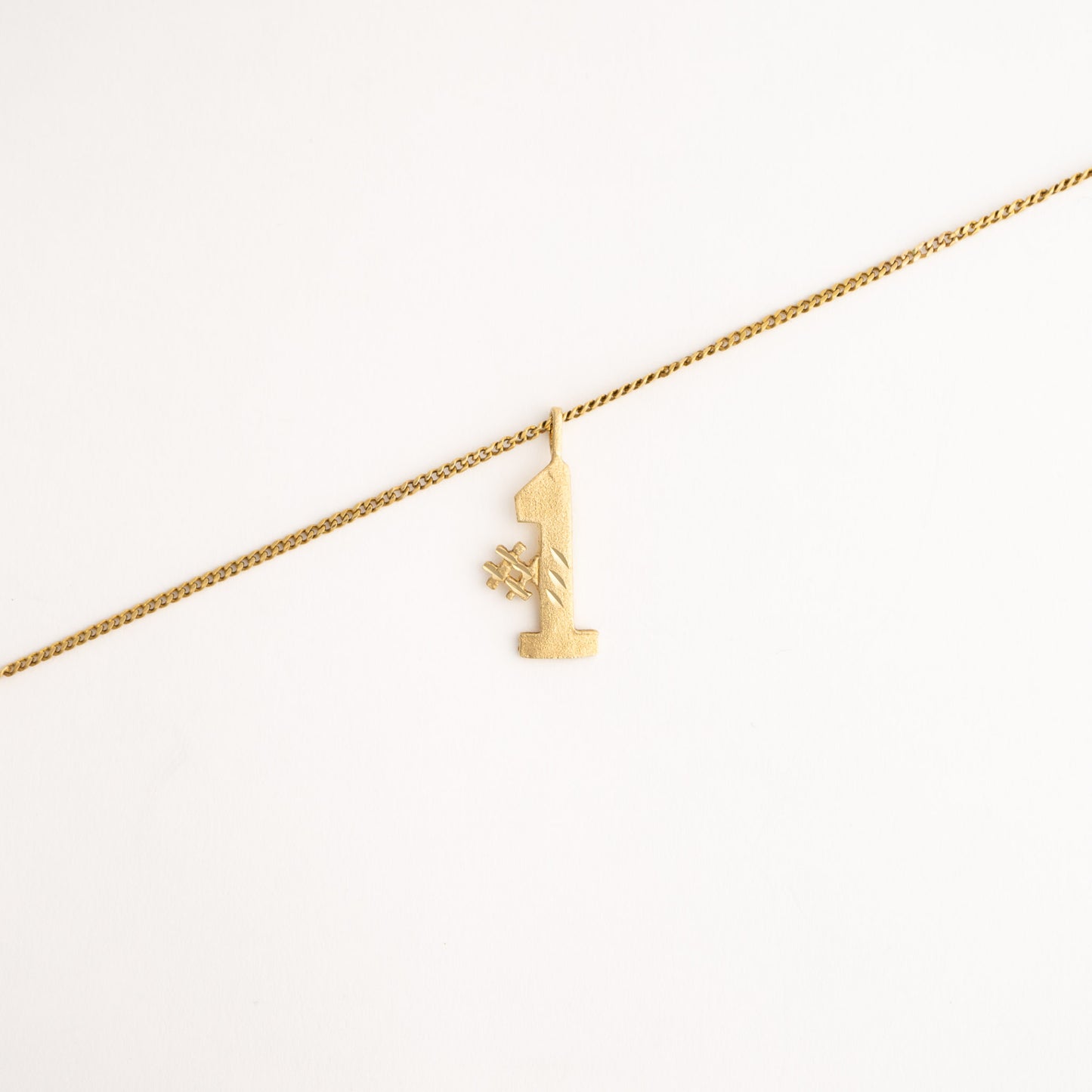 vintage 14k gold number pendant