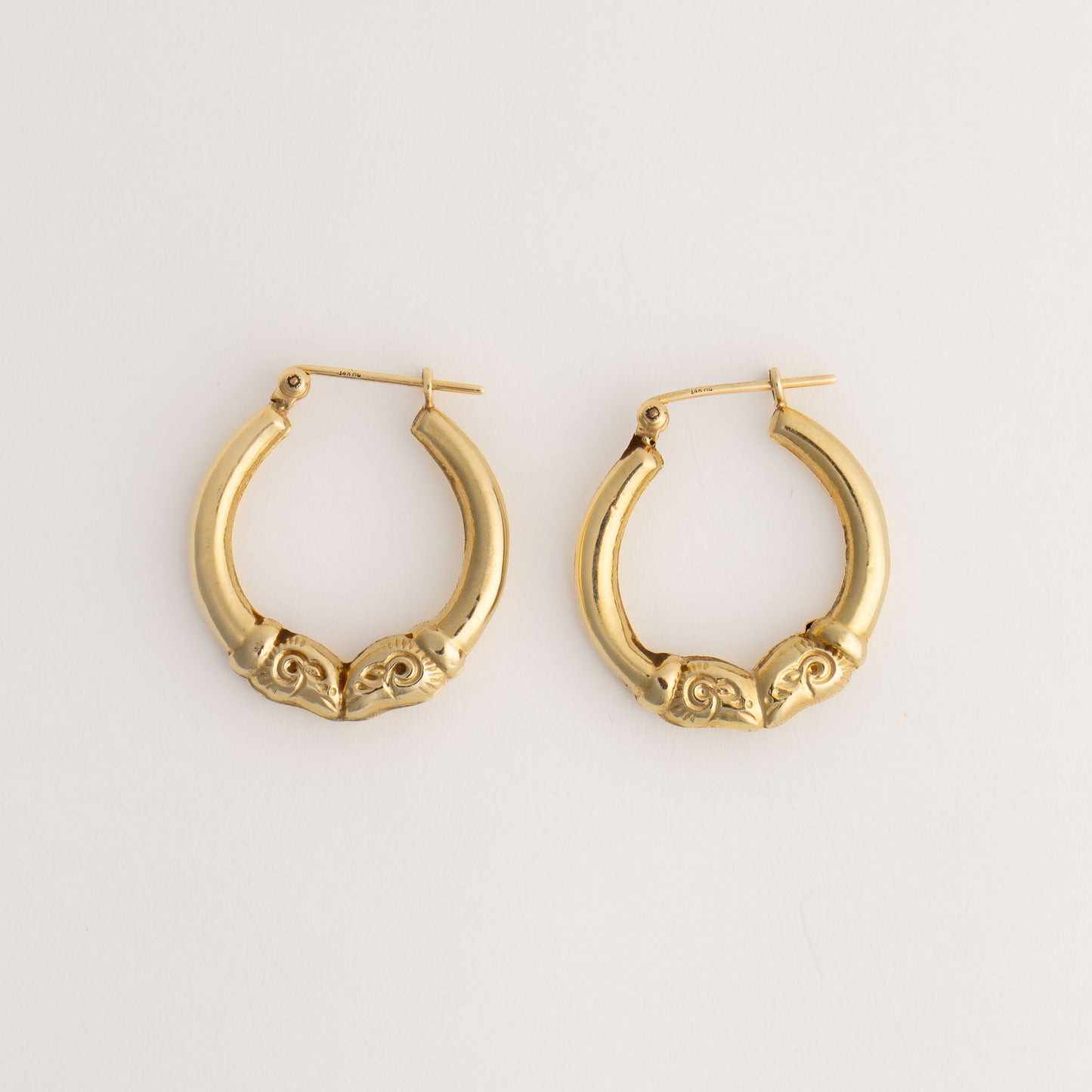 vintage 14k gold ram's head hoop earrings