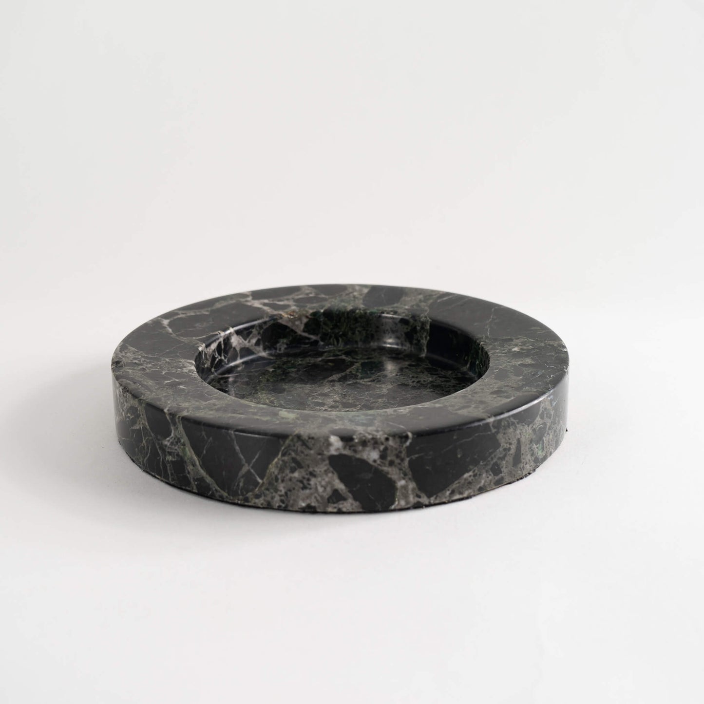 Vintage round catchall crafted from solid black marble