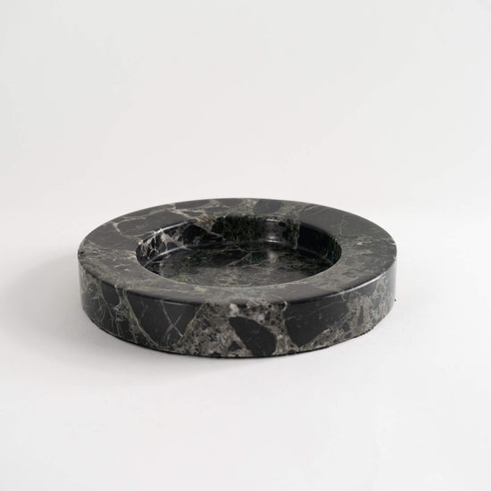 Vintage round catchall crafted from solid black marble