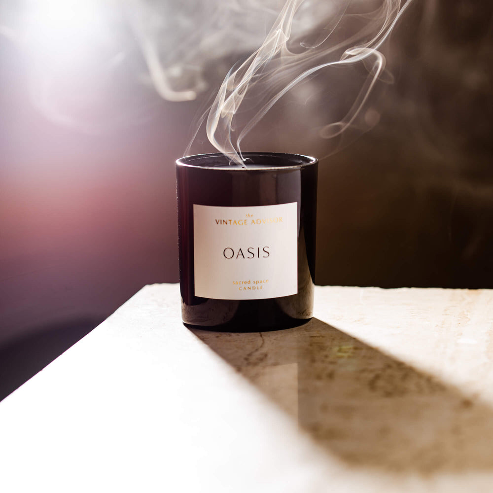 
                      
                        Enchanted Oasis sacred space candle  on travertine table
                      
                    