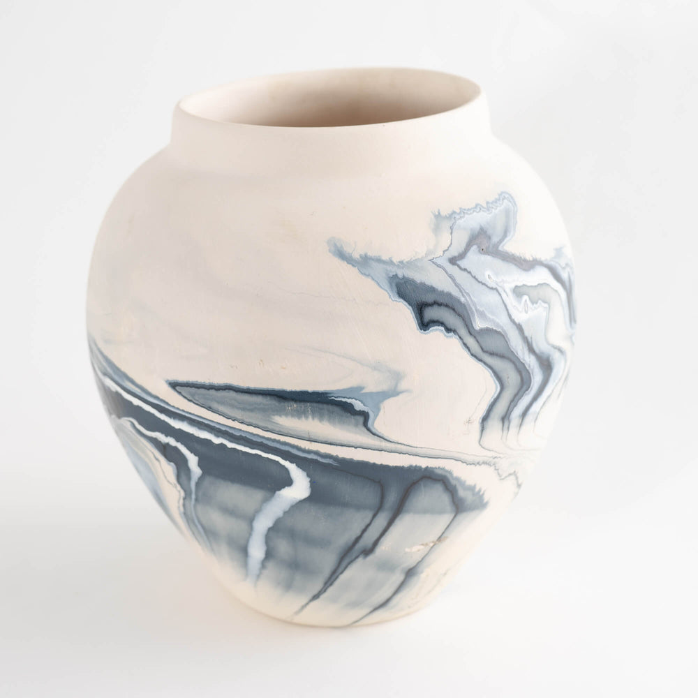 
                      
                        Vintage Blue Swirl Nemadji Pottery Vase
                      
                    