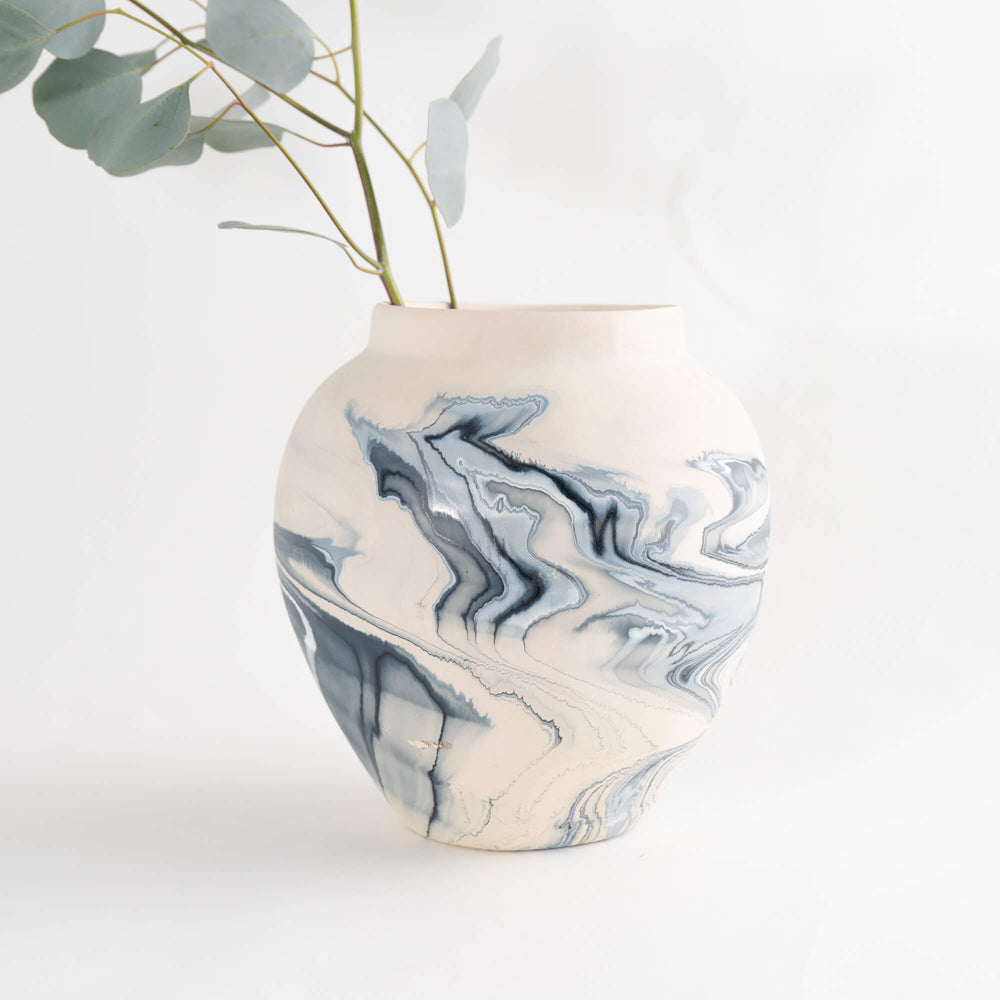 
                      
                        Vintage Blue Swirl Nemadji Pottery Vase with dry floral.
                      
                    