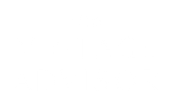 The Vintage Advisor logo in white