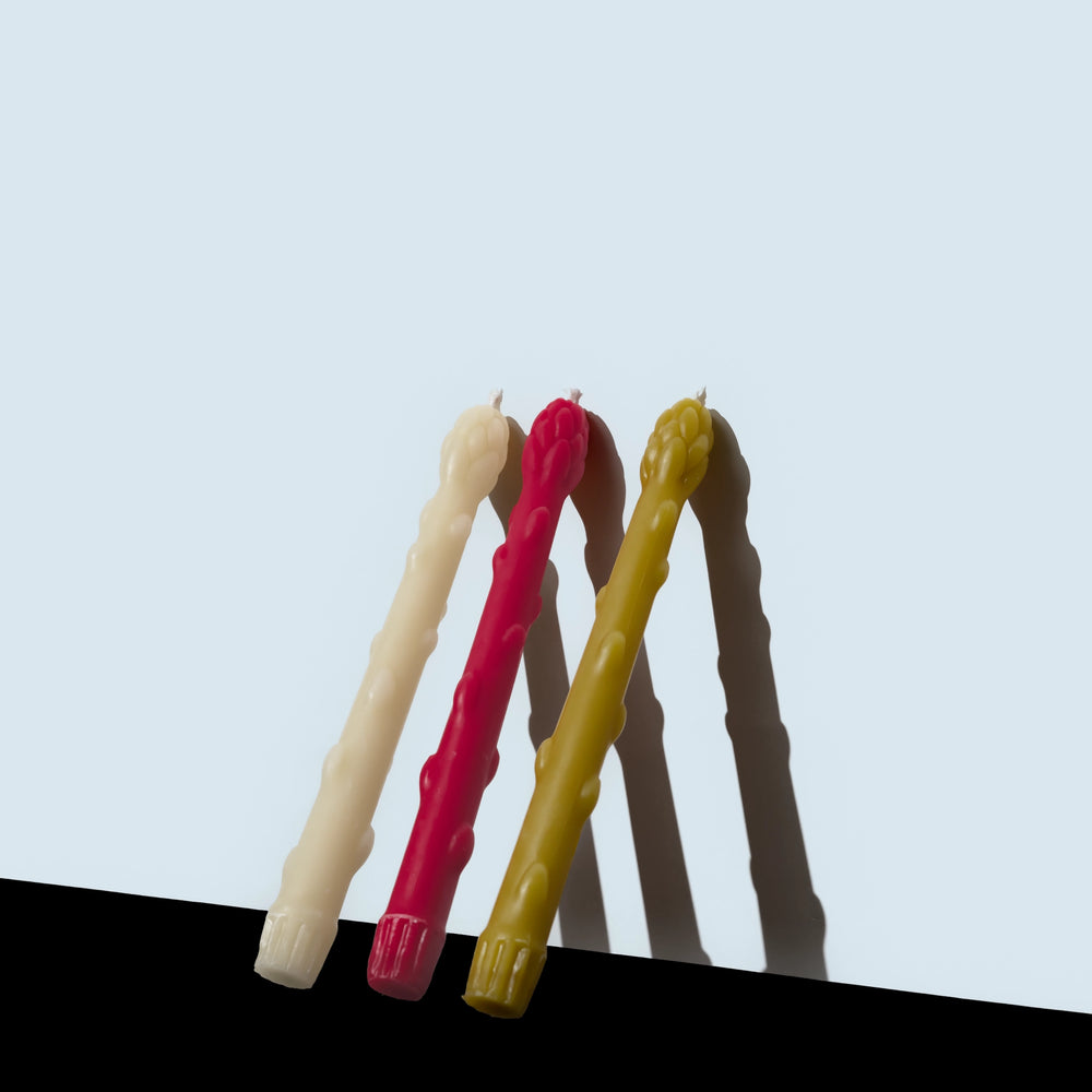 asparagus taper beeswax candles alabaster white, dragonfruit pink, citron green