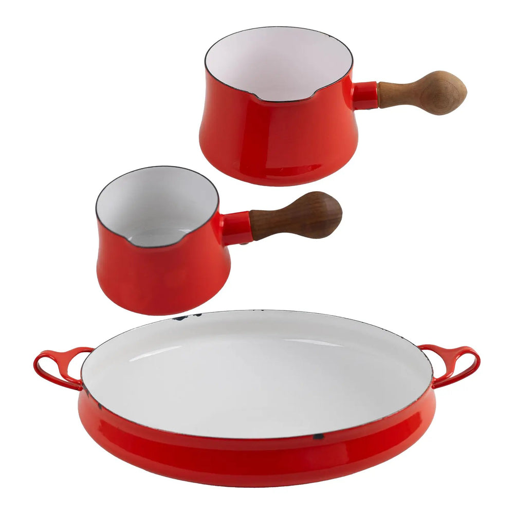 Vintage Dansk Kobenstyle red enamel cookware set featuring three pots designed by Jens Quistgaard, made in France circa 1960s.