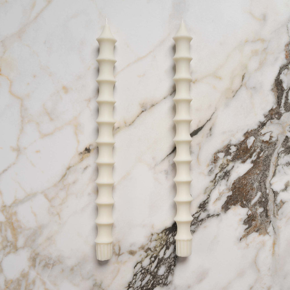 
                      
                        natural beeswax bamboo pagoda inspired taper candle pair in alabaster white
                      
                    