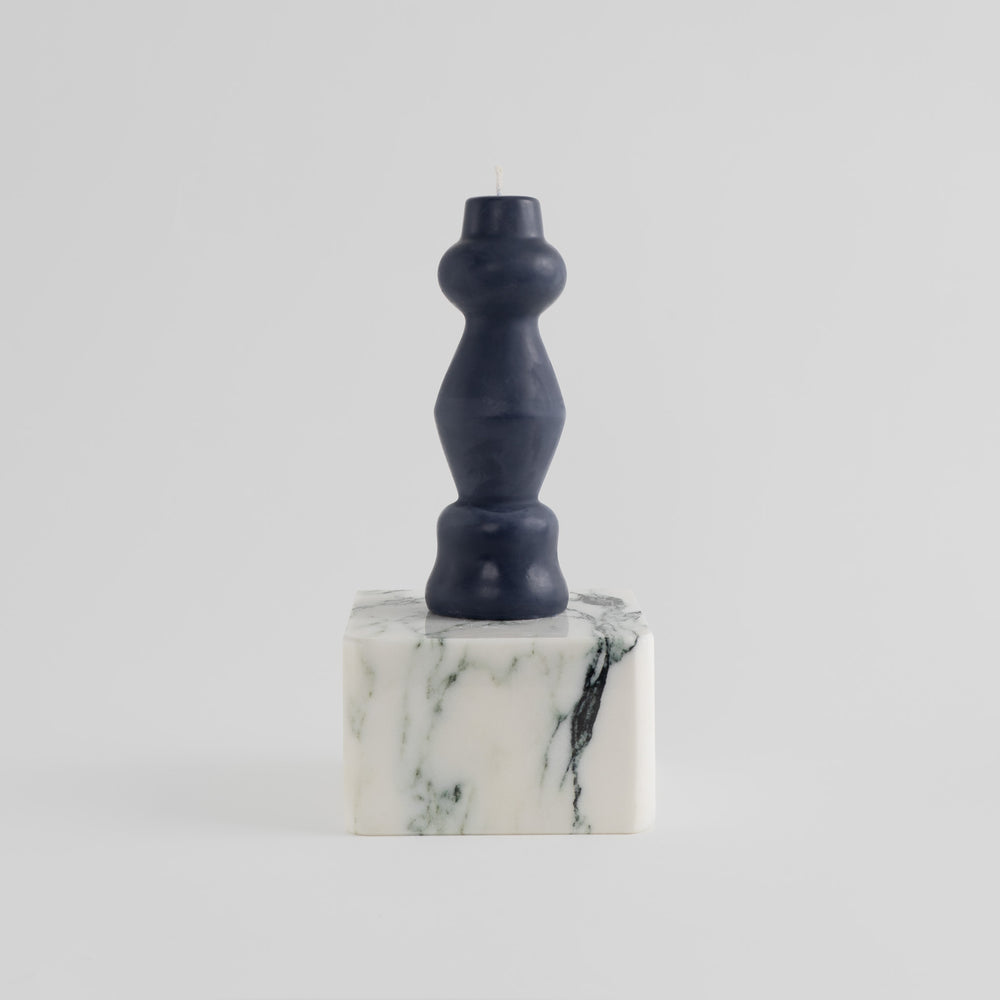 
                  
                    postmodern sculptural beeswax pillar candle midnight black
                  
                