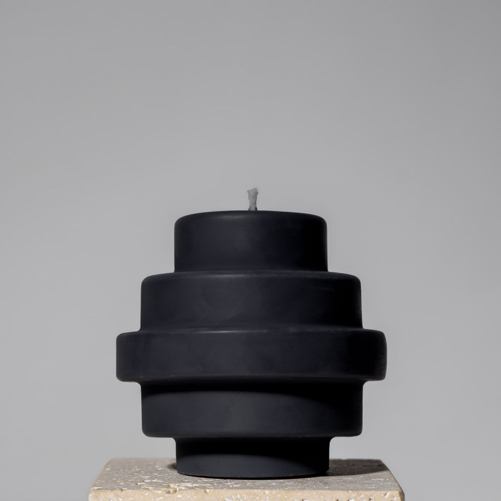 
                  
                    postmodern Memphis pedestal sculpture temple pillar candle handcrafted in midnight black
                  
                