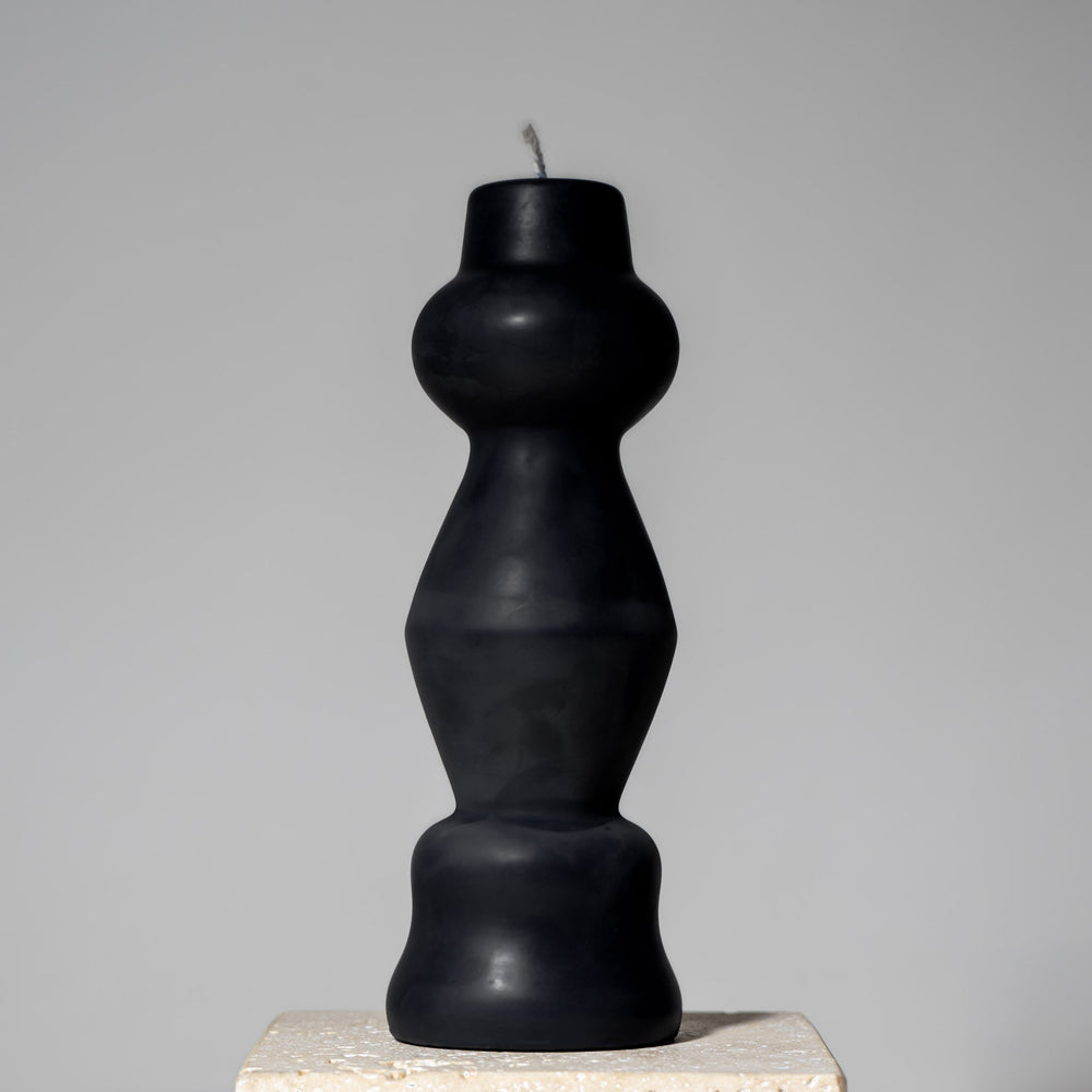 
                  
                    postmodern sculptural beeswax pillar candle midnight black
                  
                