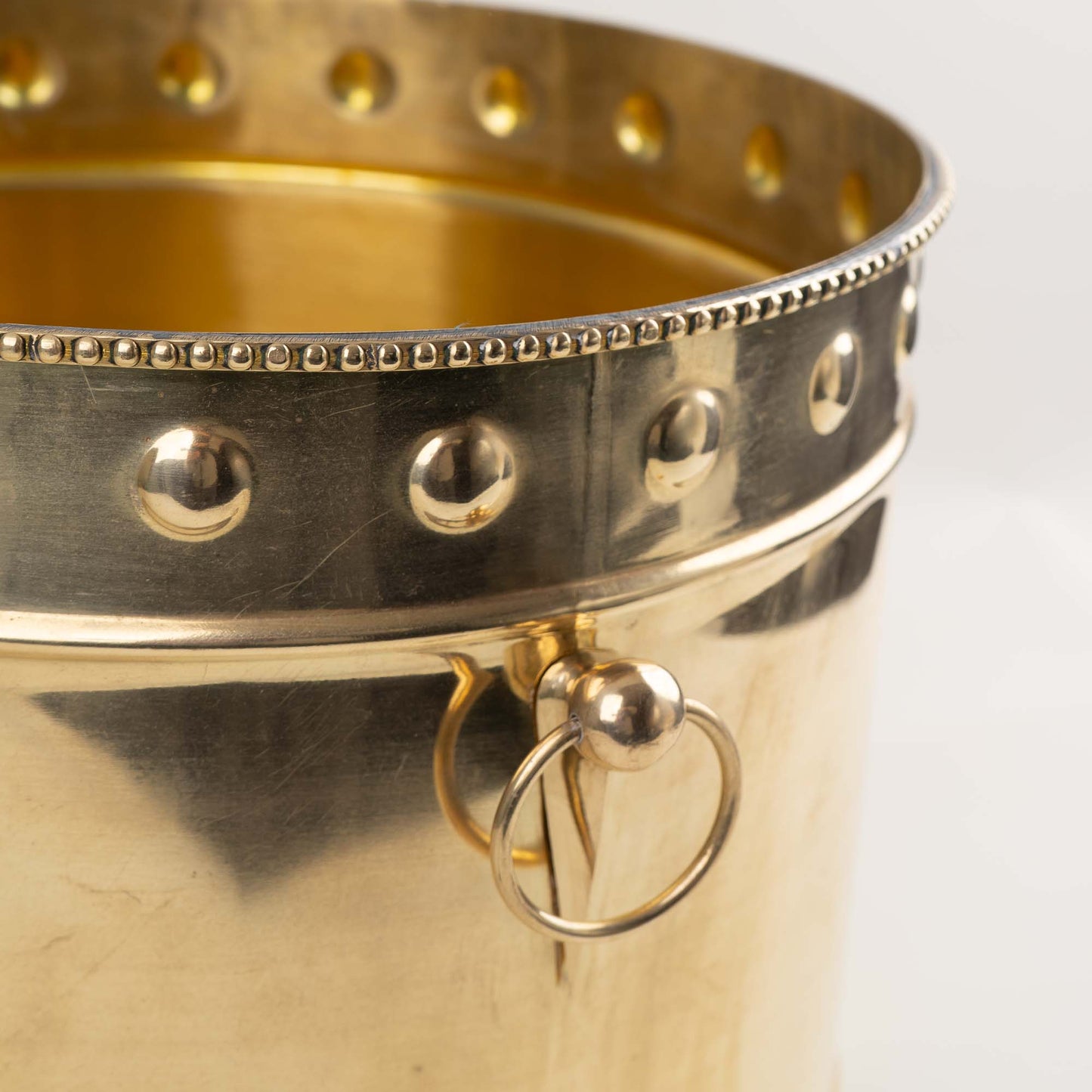 Vintage brass planter with braided rim, geometric handles and original patina 