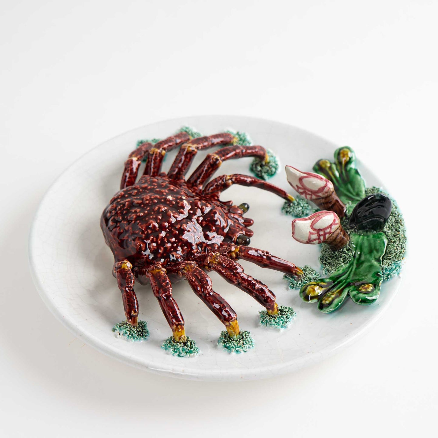 Vintage hand-painted majolica plate with trompe l'oeil red crab, seaweed and mussel in Palissy style