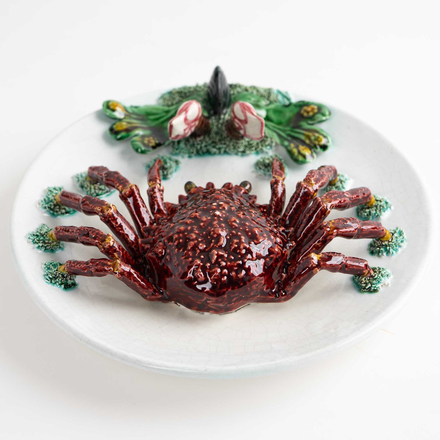 Vintage hand-painted majolica plate with trompe l'oeil red crab, seaweed and mussel in Palissy style