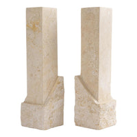 Vintage sculptural travertine candleholder pair with contrasting polished and natural stone textures