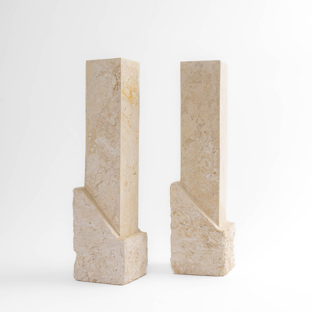 
                  
                    Vintage sculptural travertine candleholder pair with contrasting polished and natural stone textures
                  
                
