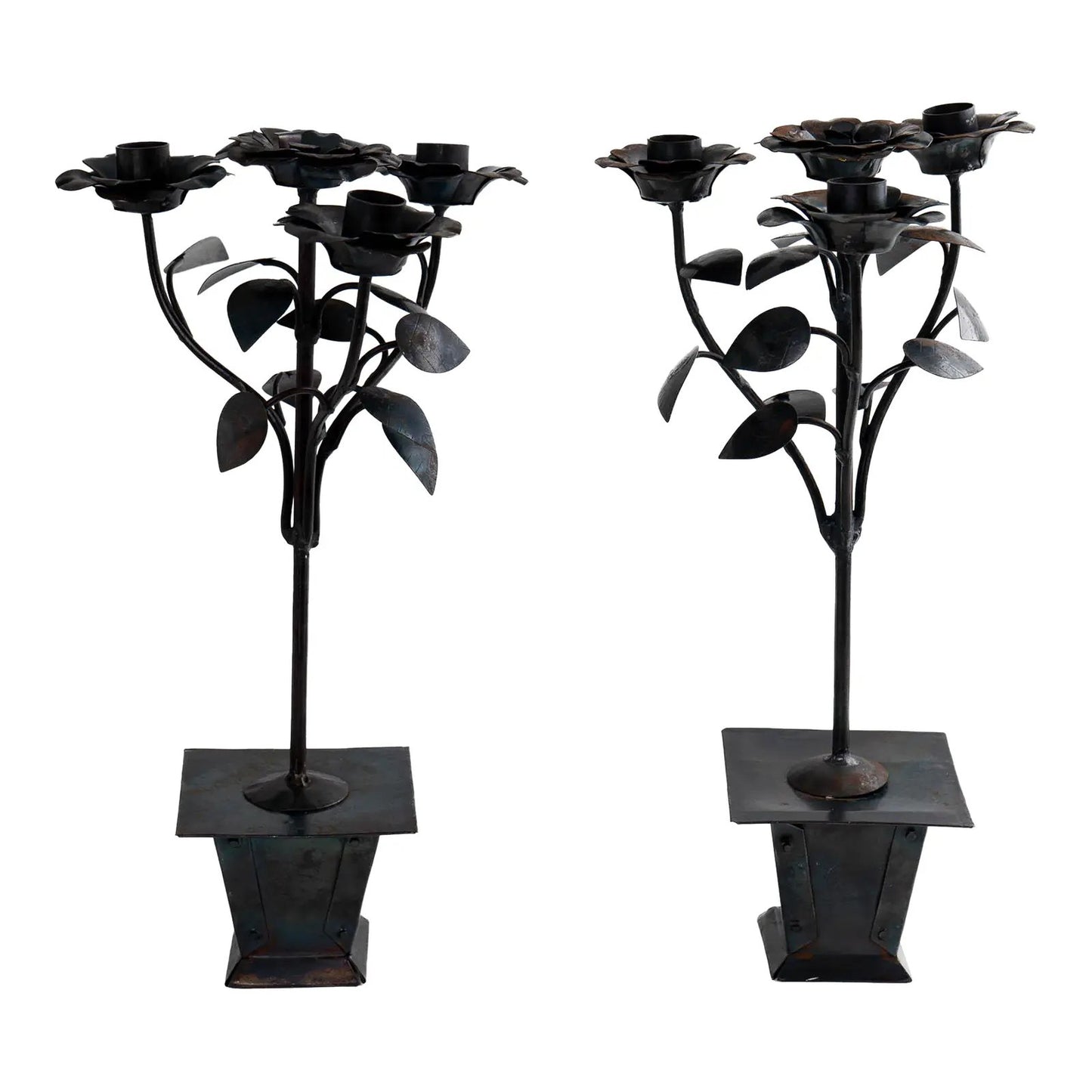 Vintage hand-crafted iron candelabra set featuring three blooming roses as taper candle holders atop a square planter base with detailed leafwork