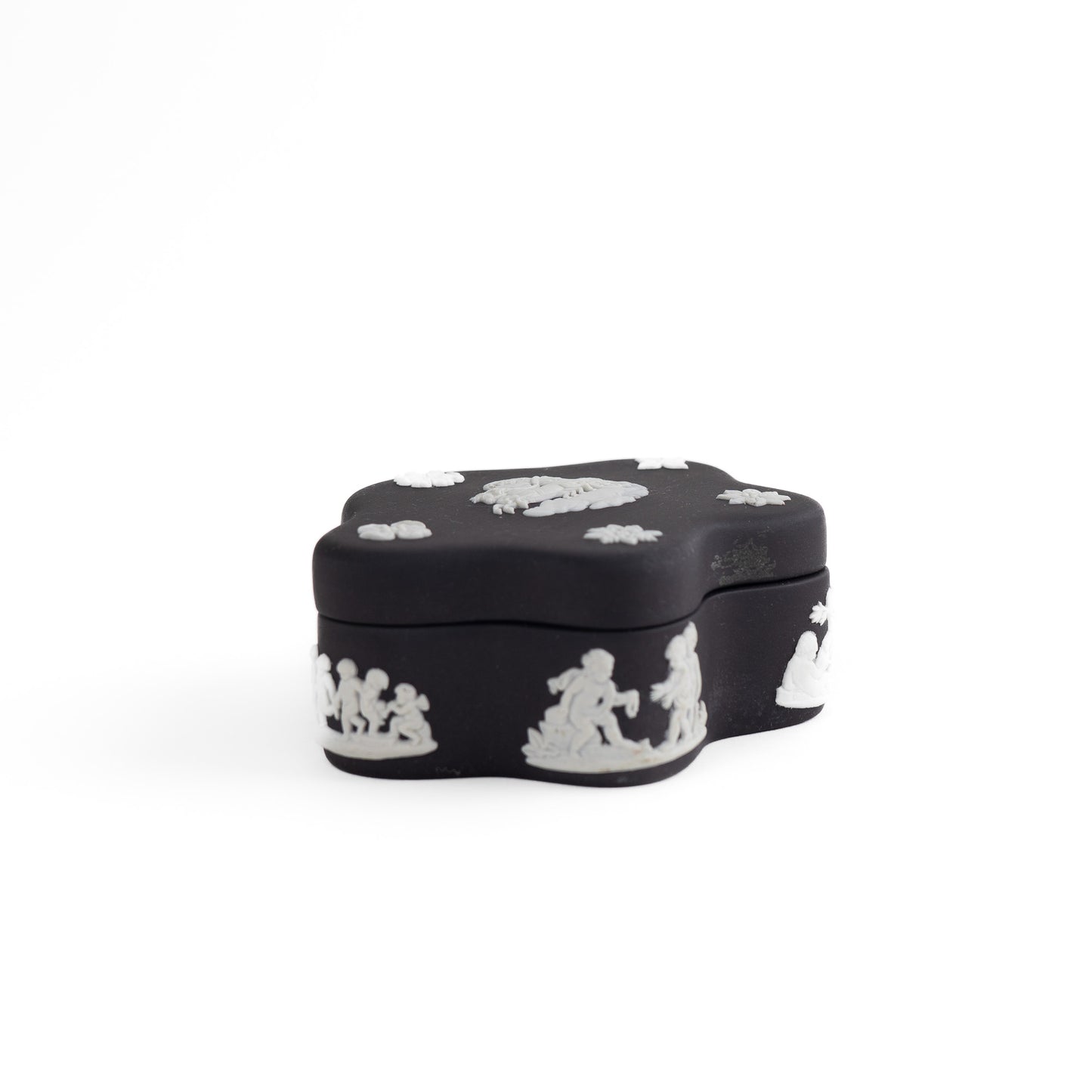 Vintage star-shaped Wedgwood black jasperware trinket box with white relief of Aurora Goddess of Dawn and cherub motifs, 1970s collectible.