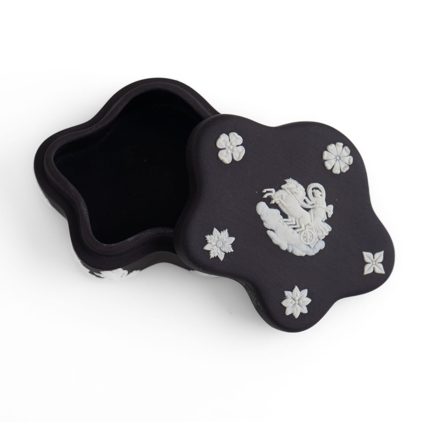 Vintage star-shaped Wedgwood black jasperware trinket box with white relief of Aurora Goddess of Dawn and cherub motifs, 1970s collectible.