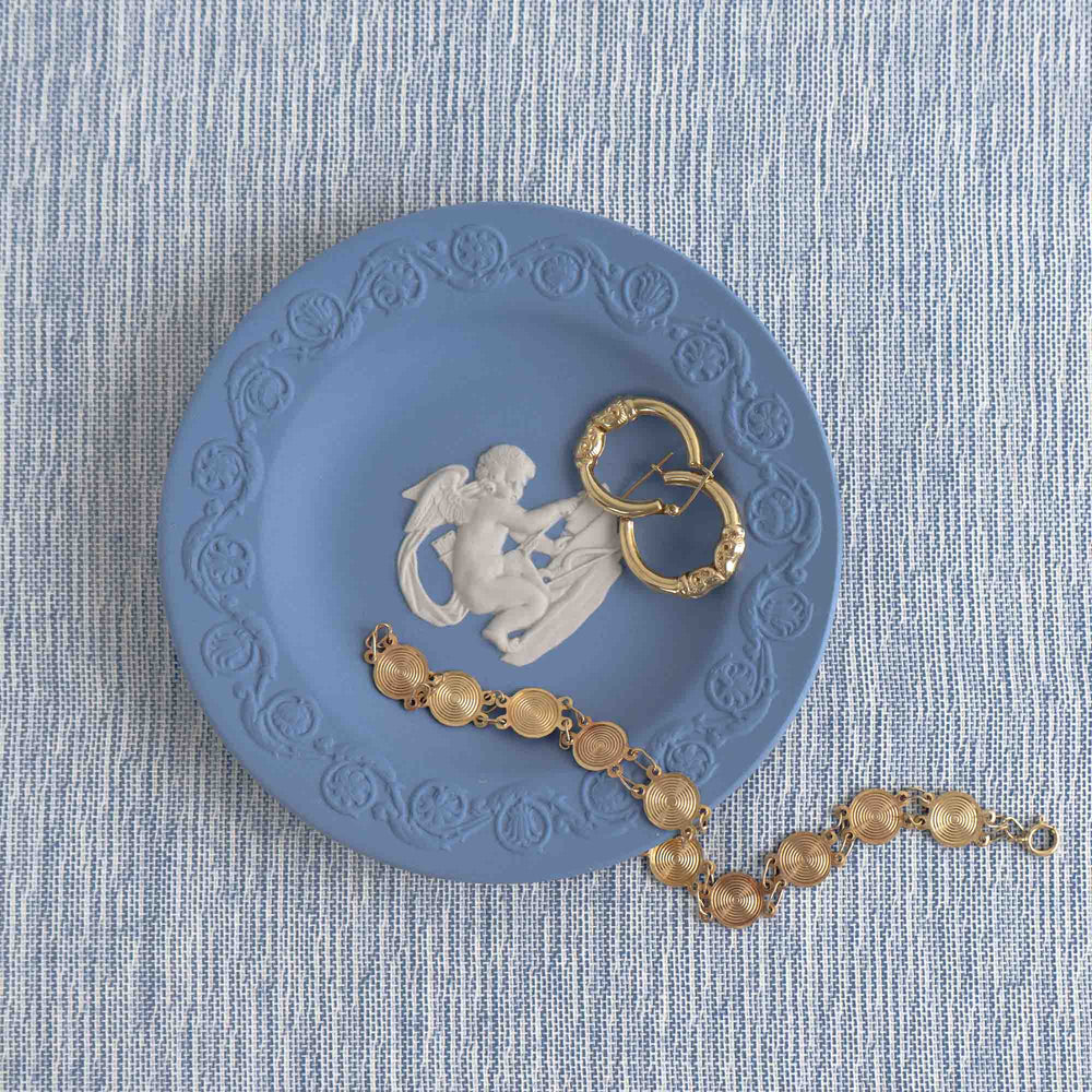
                  
                    Vintage blue Wedgwood jasperware plate featuring white relief of Cupid, 1970s collectible decorative plate
                  
                