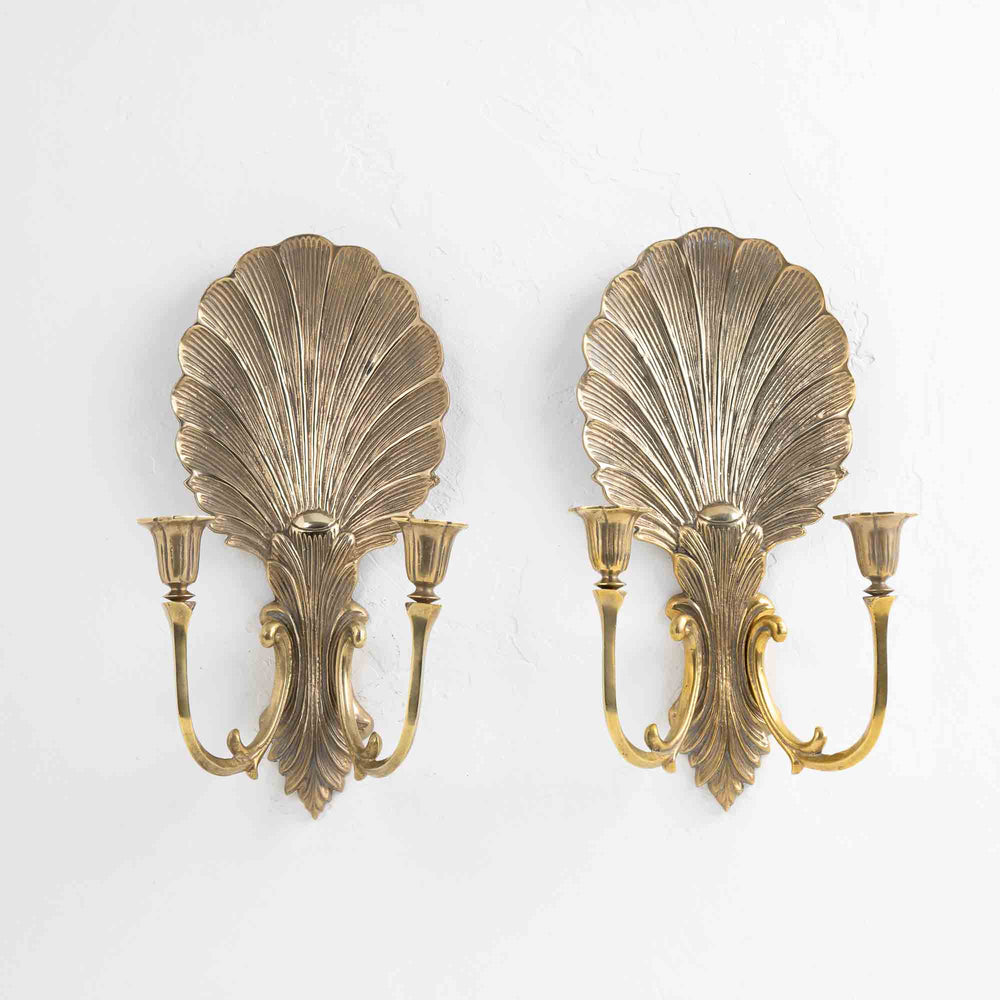 
                  
                    Vintage solid brass wall sconce candleholders with clamshell and scroll design, pair of two, each holding two taper candles
                  
                