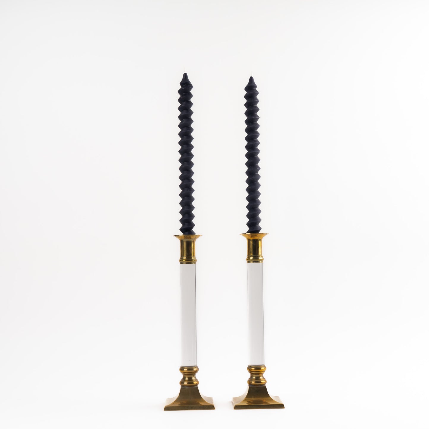 Vintage pair of transparent Lucite candleholders with brass accents for taper candles, styled in Hollywood Regency interior