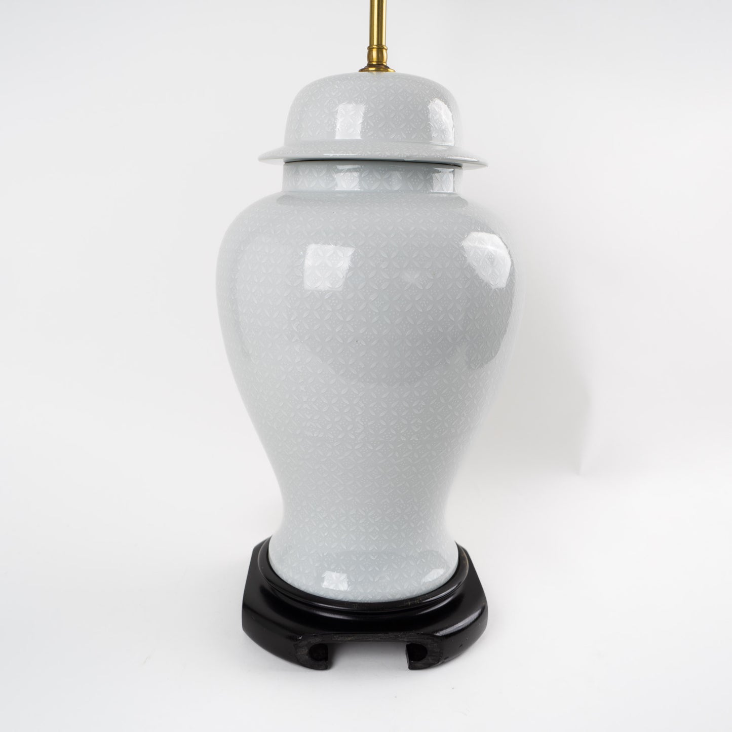 Close-up of white Chinoiserie pattern detail on grey porcelain ginger jar lamp showing delicate Asian-inspired motifs