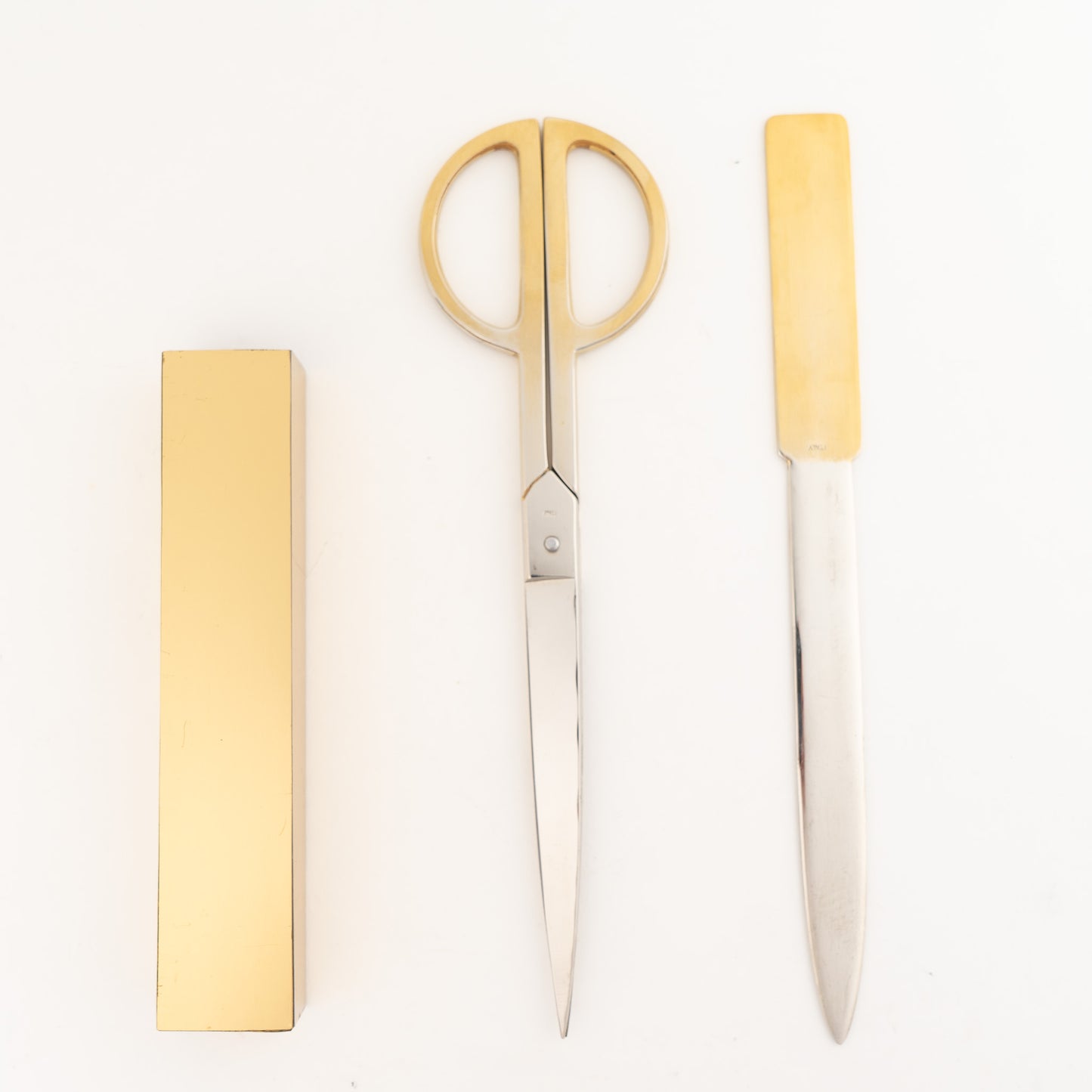  Vintage Italian brass-plated scissors and letter opener set displayed with original protective case, showing elegant desk accessories made in Italy