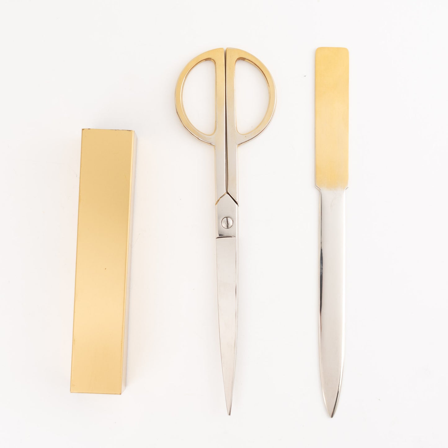  Vintage Italian brass-plated scissors and letter opener set displayed with original protective case, showing elegant desk accessories made in Italy