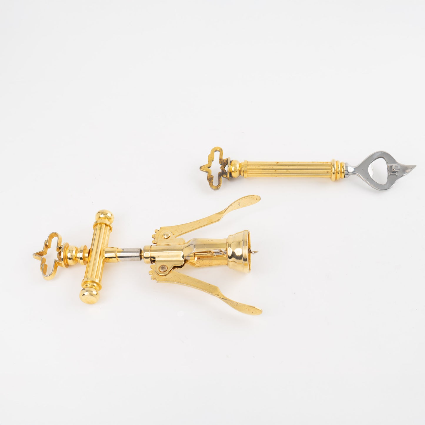 Vintage Italian brass corkscrew and bottle opener set from the 1970s-80s, showing elegant brass-plated metal construction