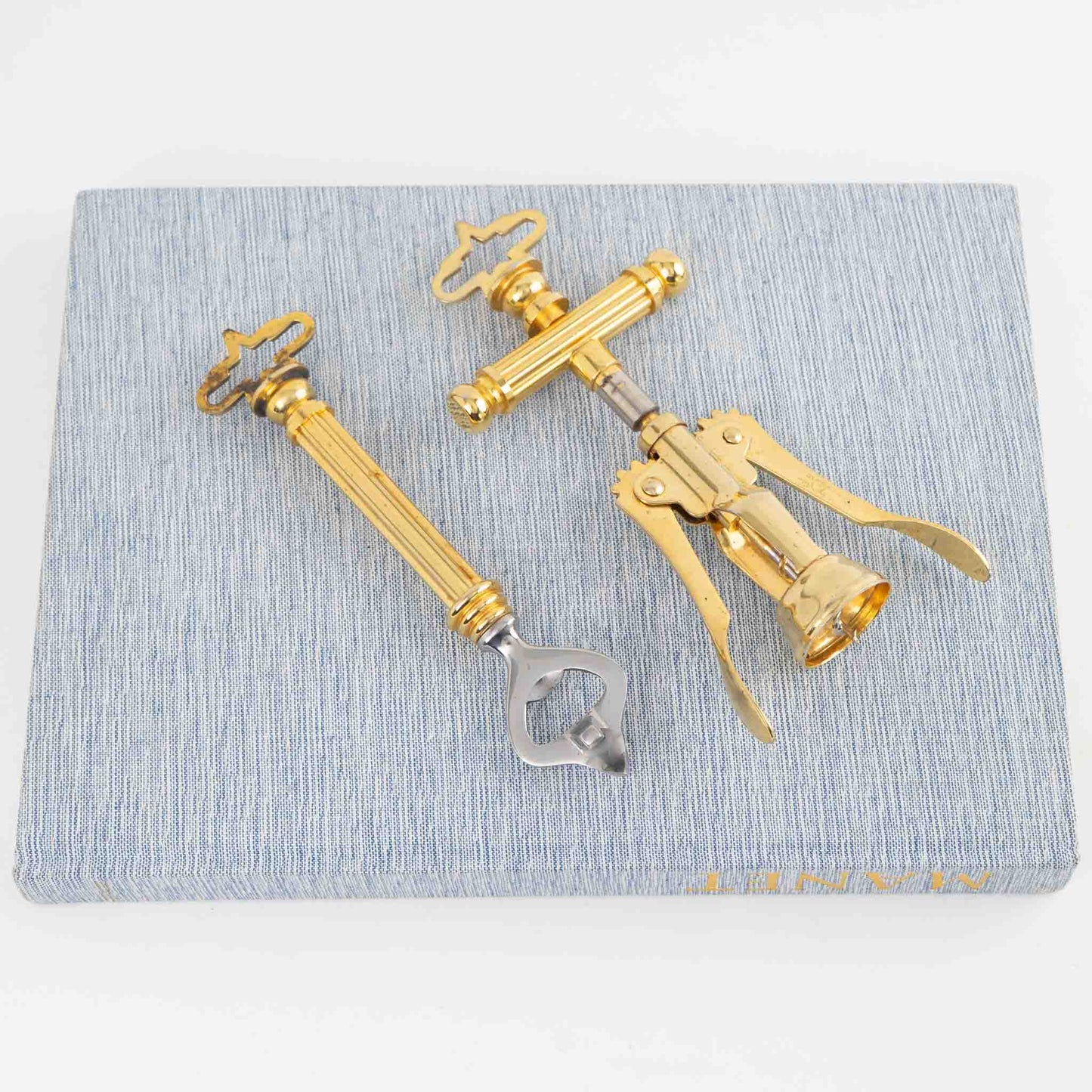 Vintage Italian brass corkscrew and bottle opener set from the 1970s-80s, showing elegant brass-plated metal construction