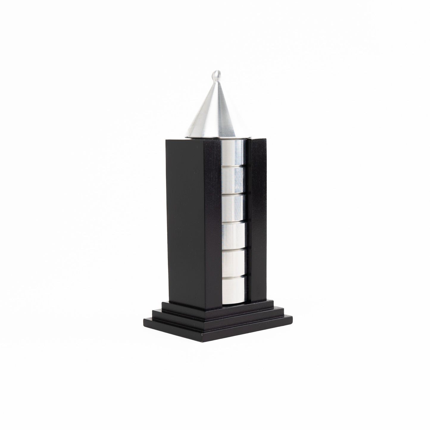 Vintage black building-shaped napkin ring holder displaying six silver metal napkin rings for elegant table setting storage