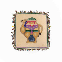 Vintage square needlepoint pillow with hand-stitched camel design and decorative beaded trim around edges